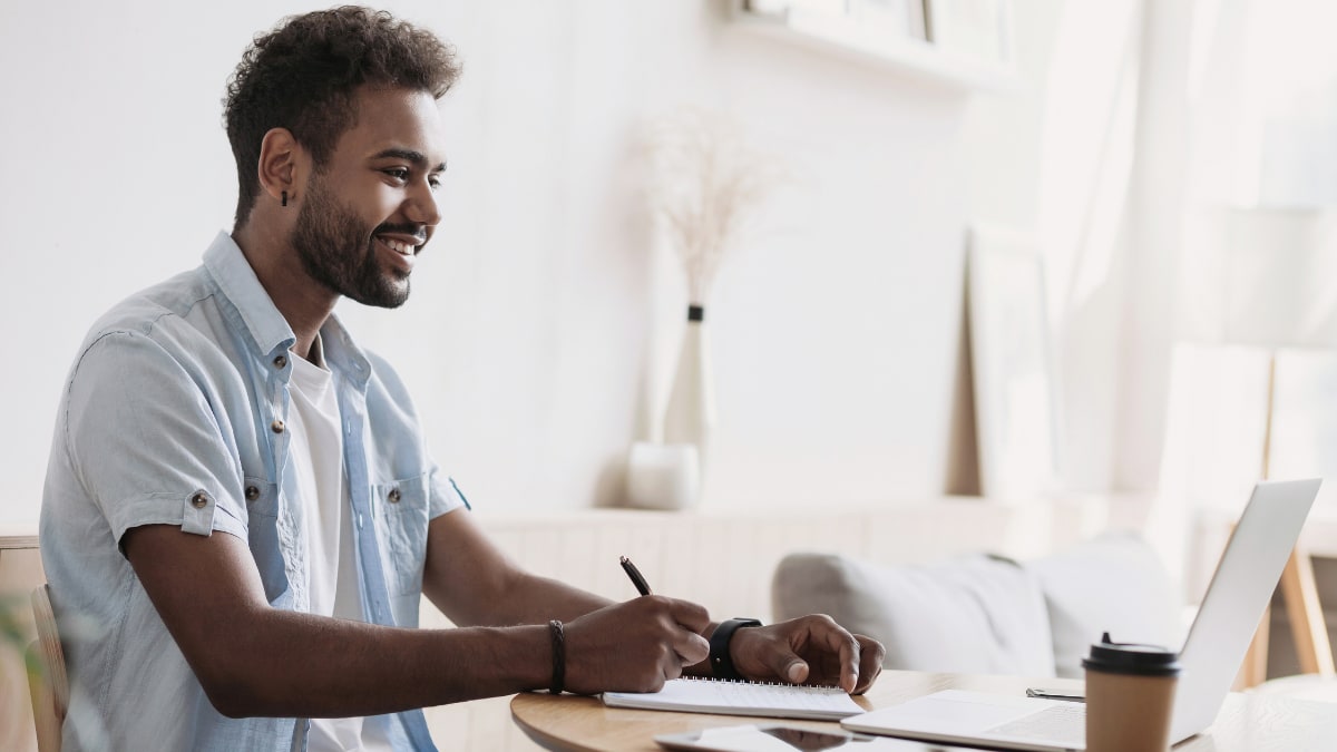 Male college student taking an online college class