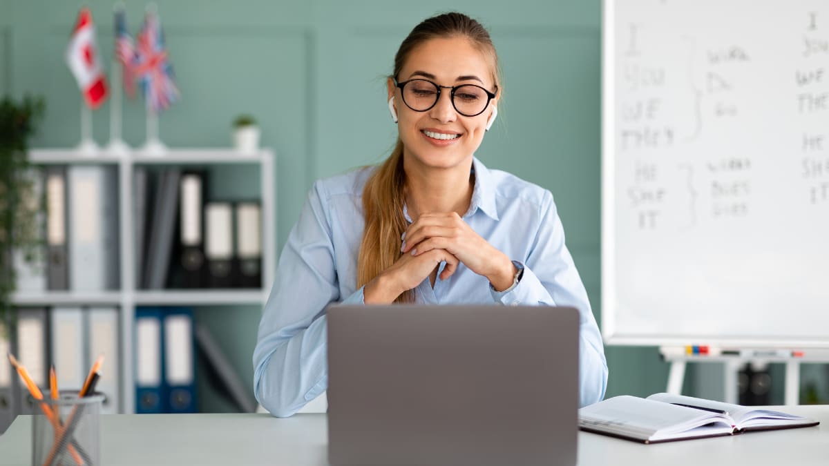 Female teacher teaching a class online