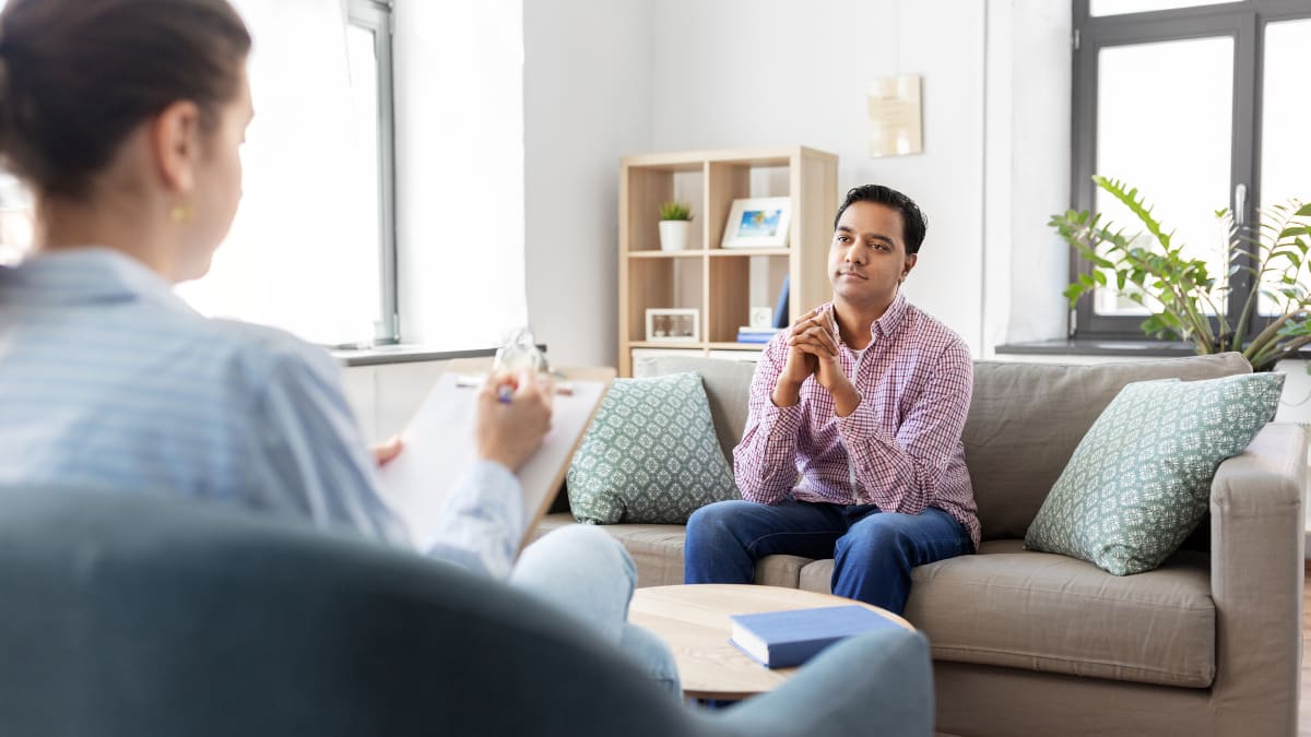 female psychologist talking with a male client