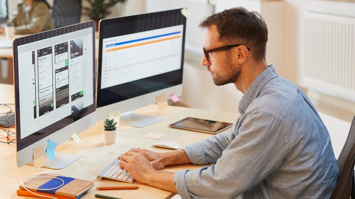 IT professional working at his desk