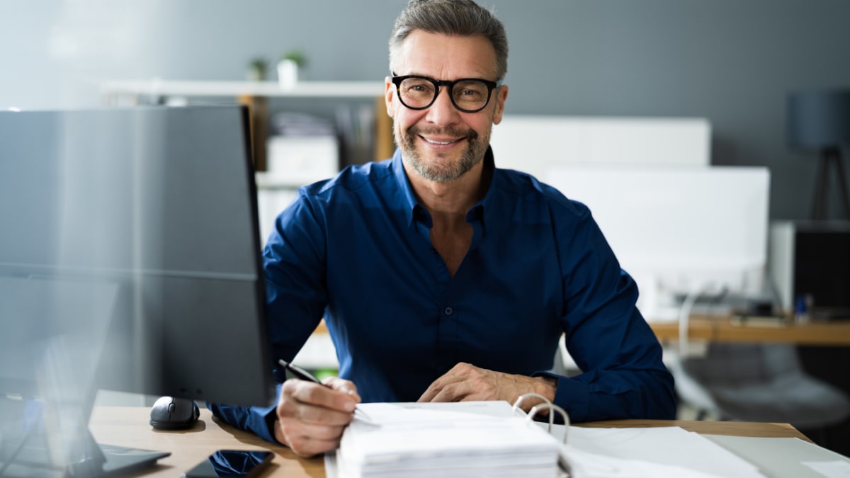 accountant working on sales invoice accounting