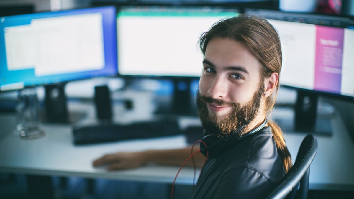 IT professional sitting in front of a computer