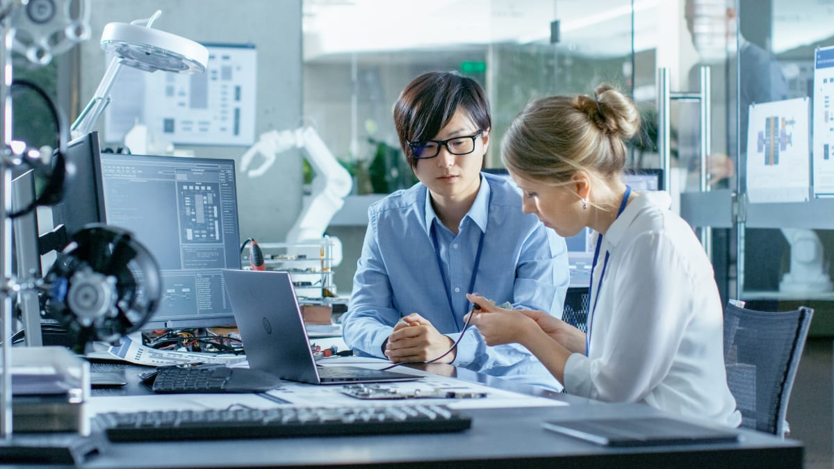 computer programmers working in a computer lab