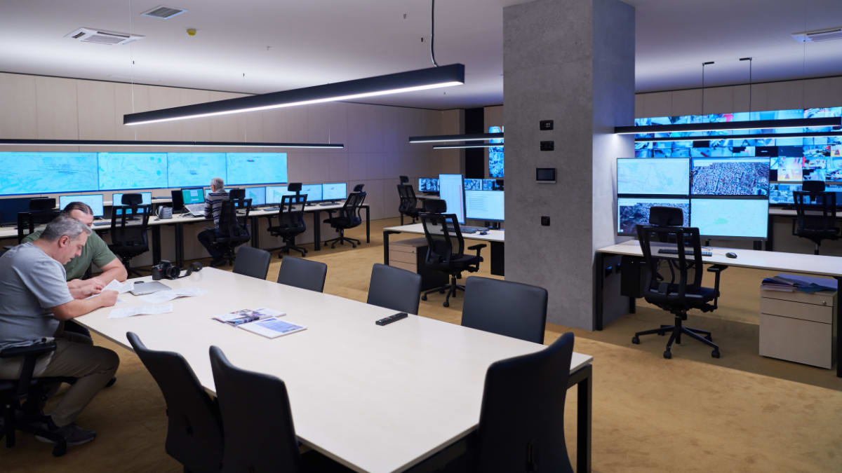 security data center where a group of cyber security professionals are working