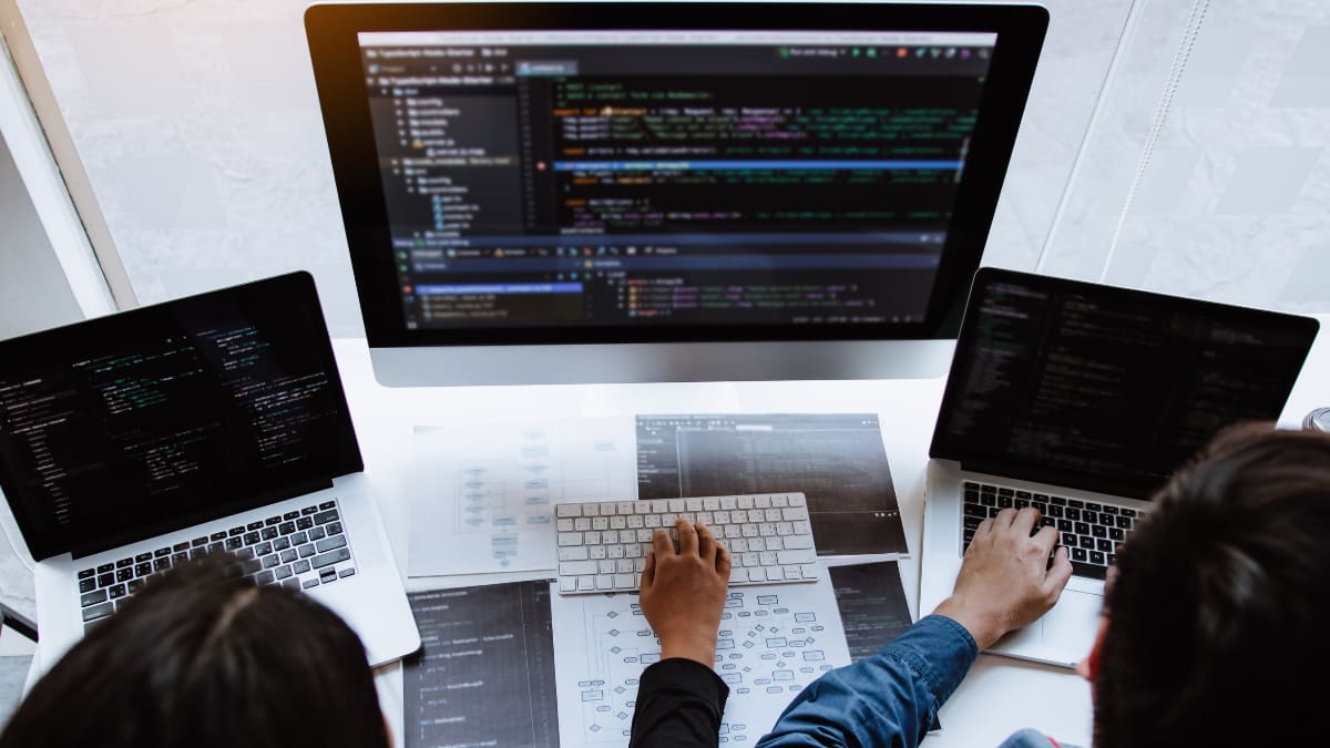 cyber security analyst working at a computer