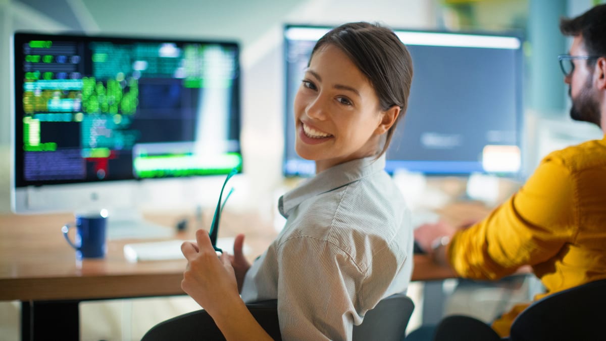 cyber security professional working in an office