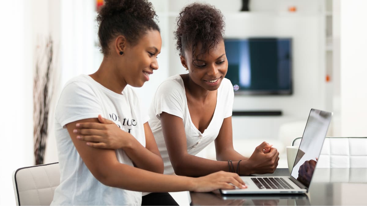 two HBCU students working on online classes