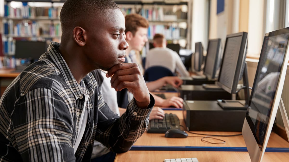 online college student working on an online associate program