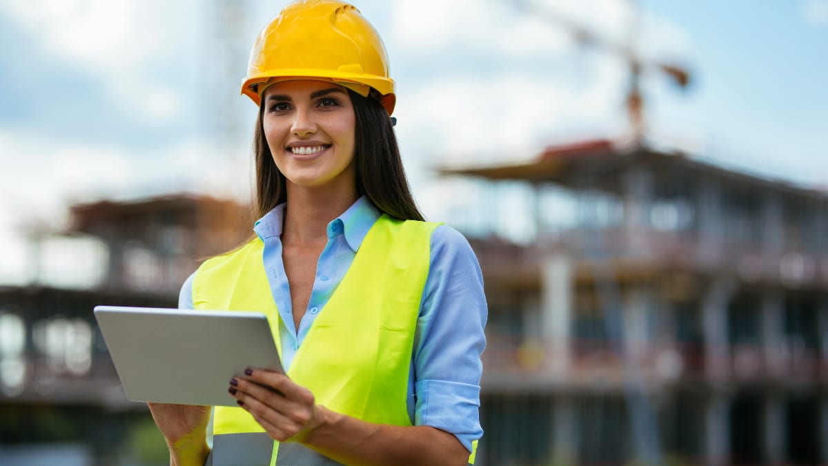 construction manager looks over a building site