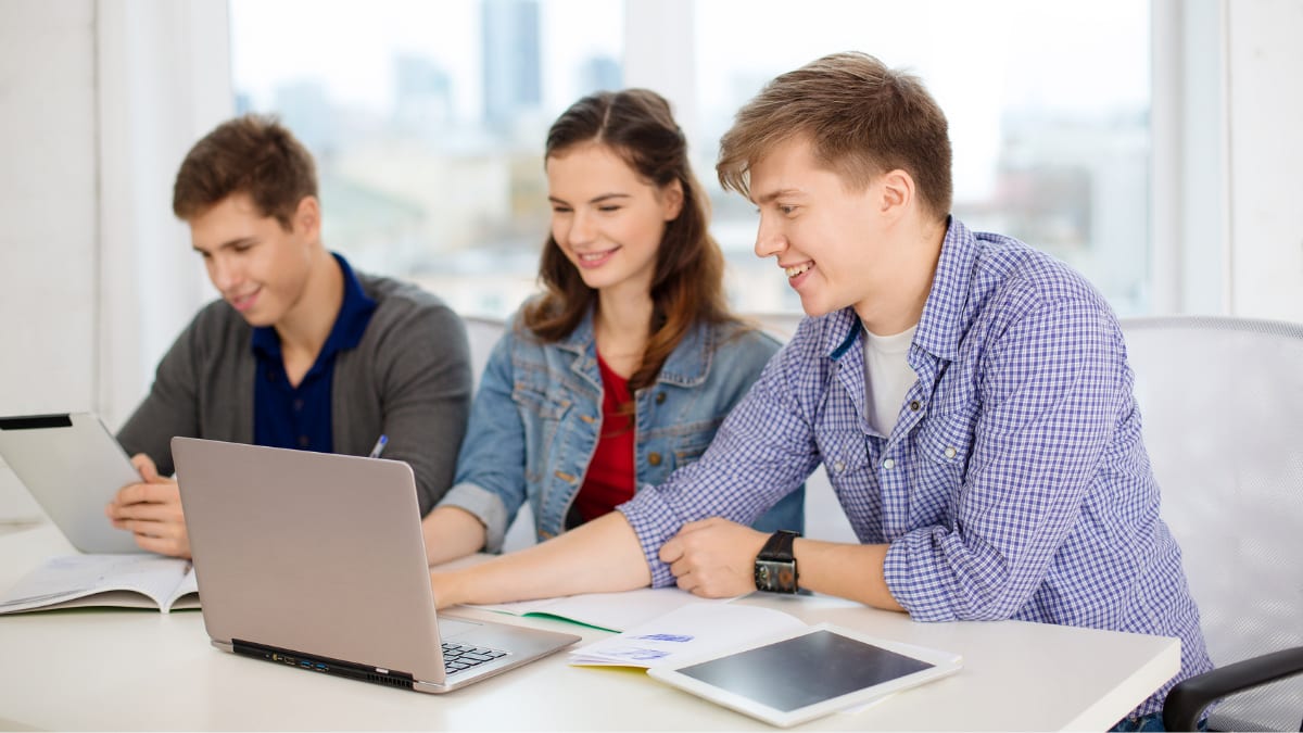 group of MBA students working in a classroom