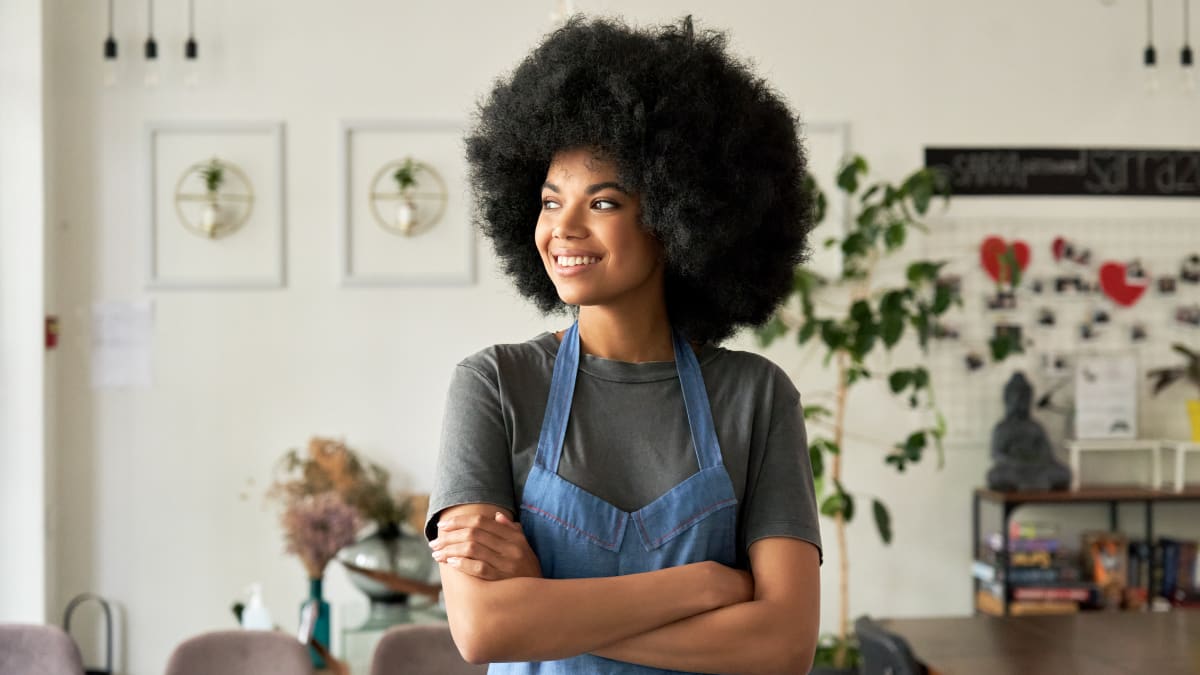 young entrepreneur standing in her office