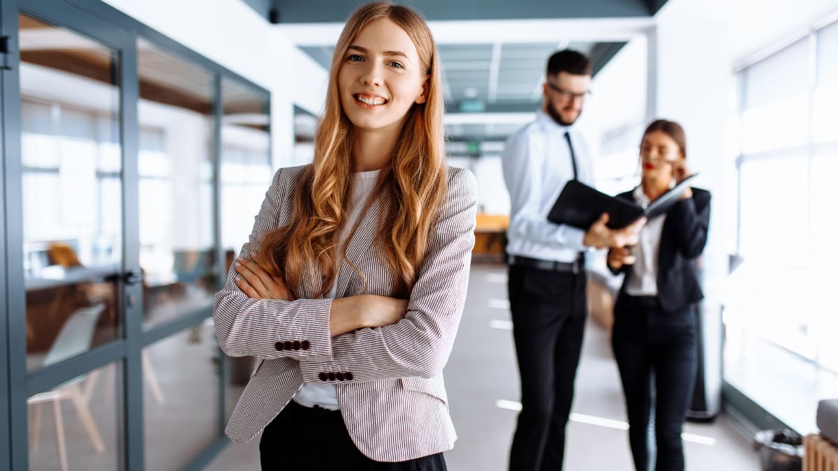 young professional standing in an office