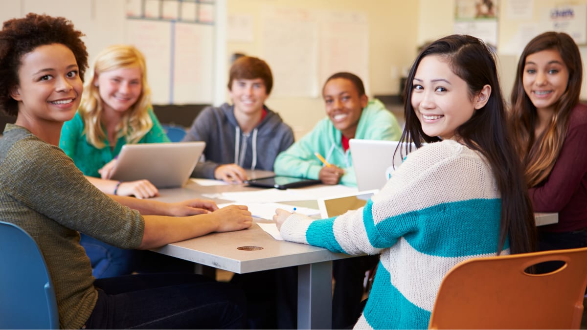 group of college students sitting together to study