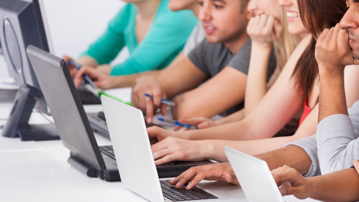 college students using computers in a lab setting