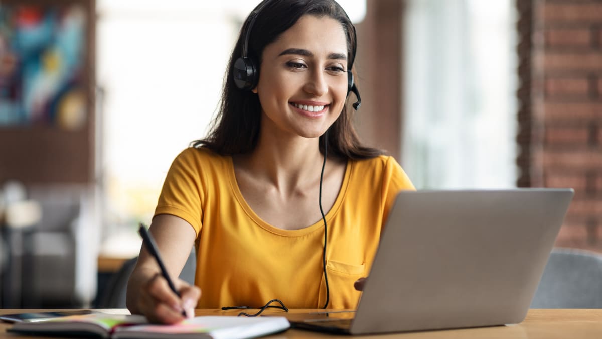 online college student watching a synchronous online lecture