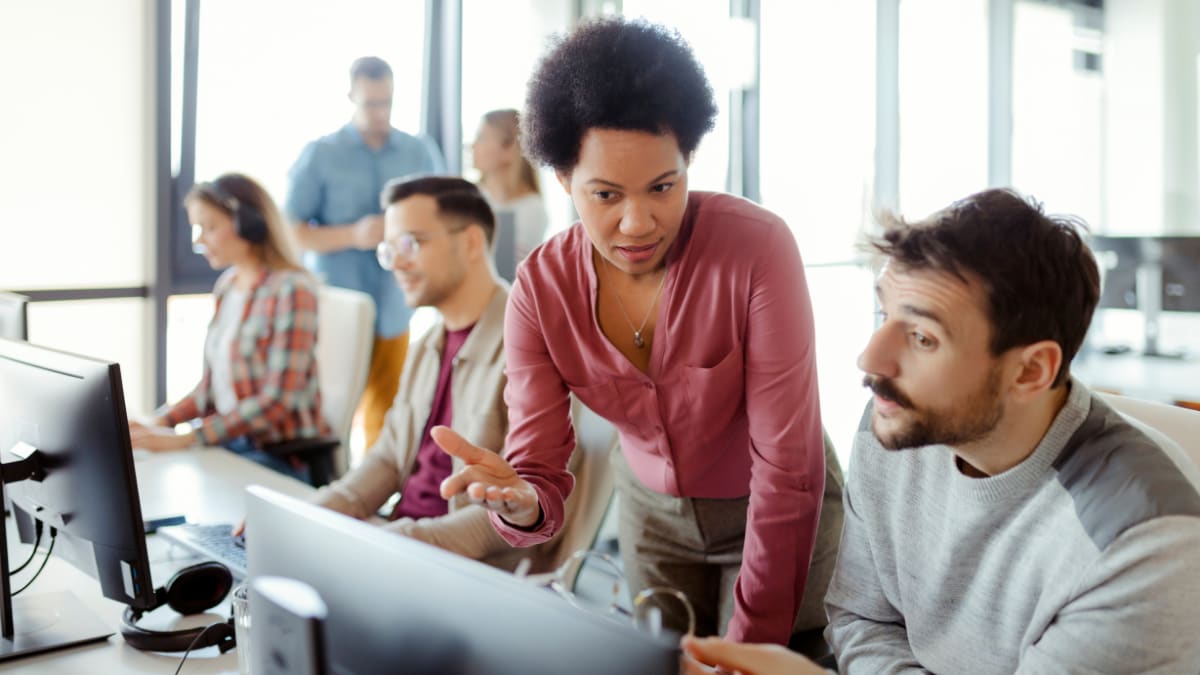 cyber security professionals working in an office