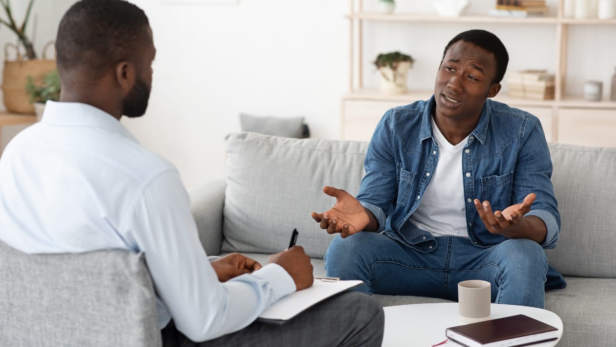 psychologist meeting with one of his clients