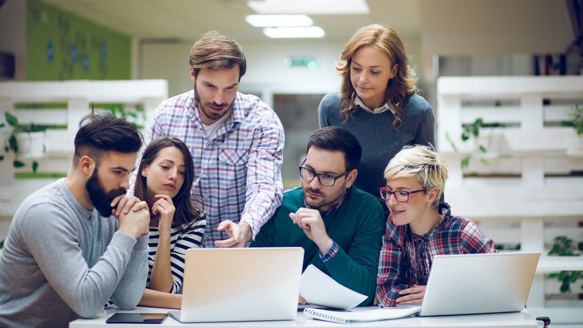 business team looking at a computer screen together