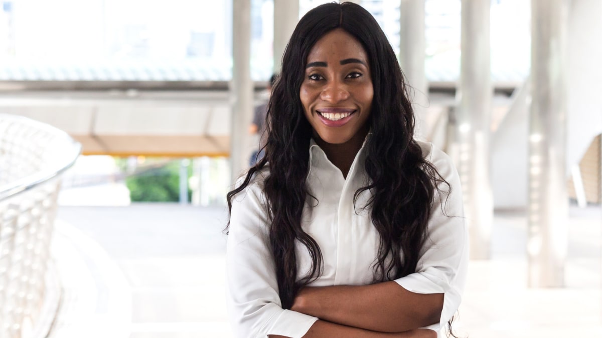 young business professional standing in an office