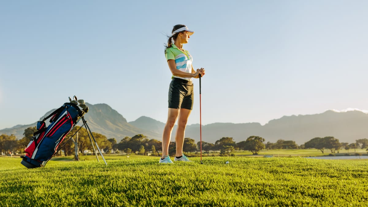golfer standing on a golf course