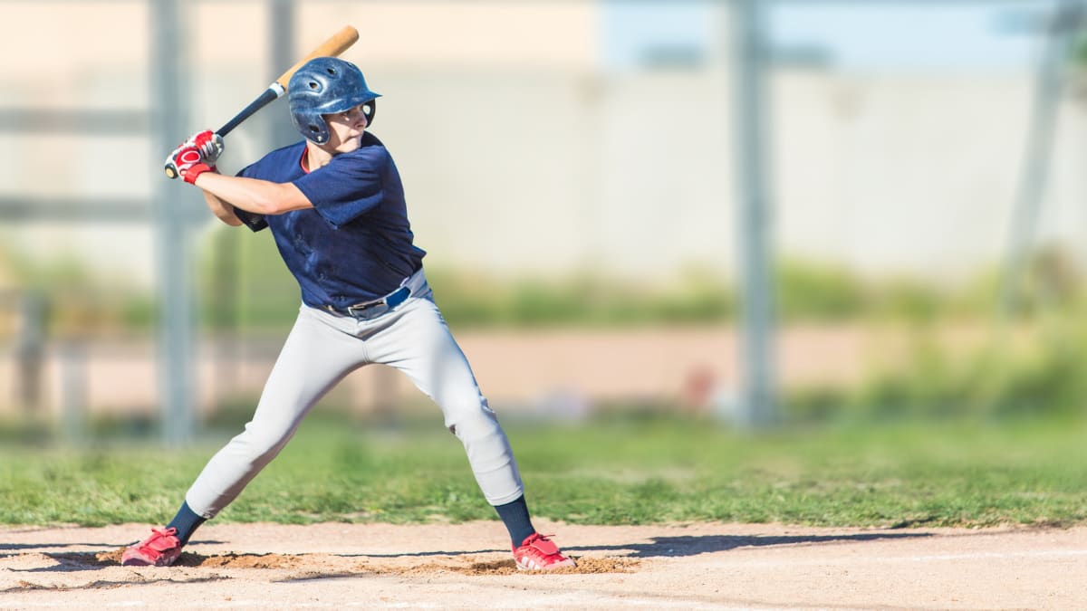 baseball player getting ready to hit a pitch