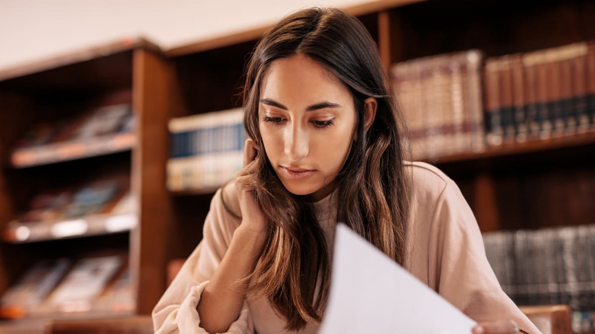college student studying in the library
