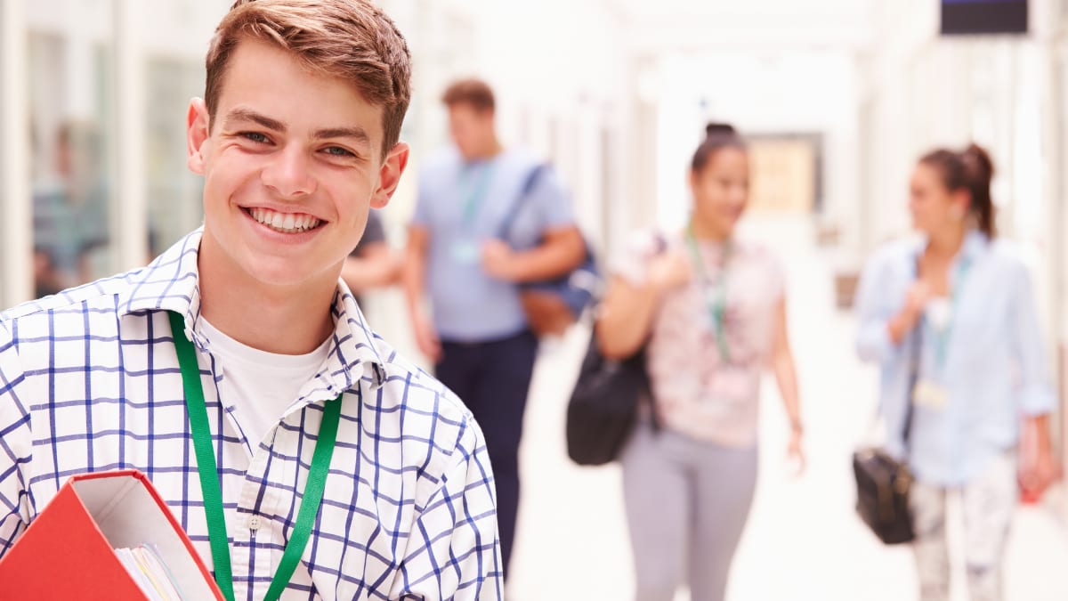 college student inside a building on a college campus