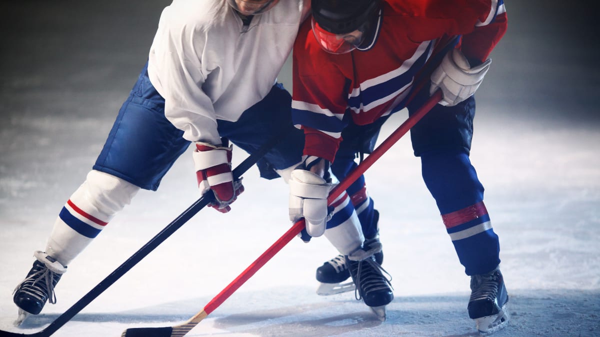 two hockey players in a game