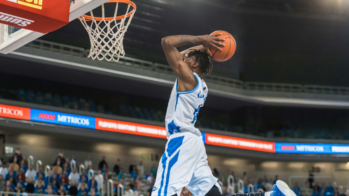 basketball player shooting a basket