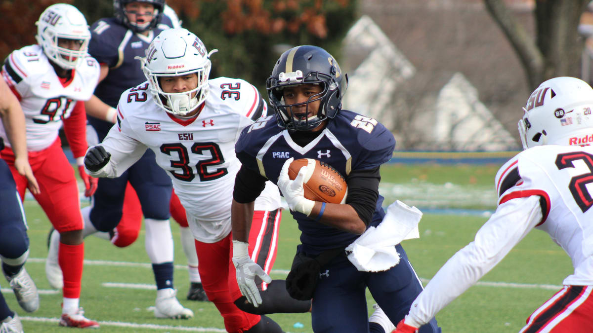 football player running with the football