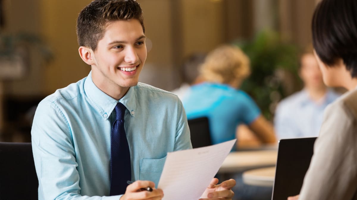 young business professional sitting in a job interview