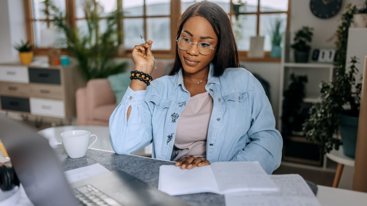 young college student working on an online course