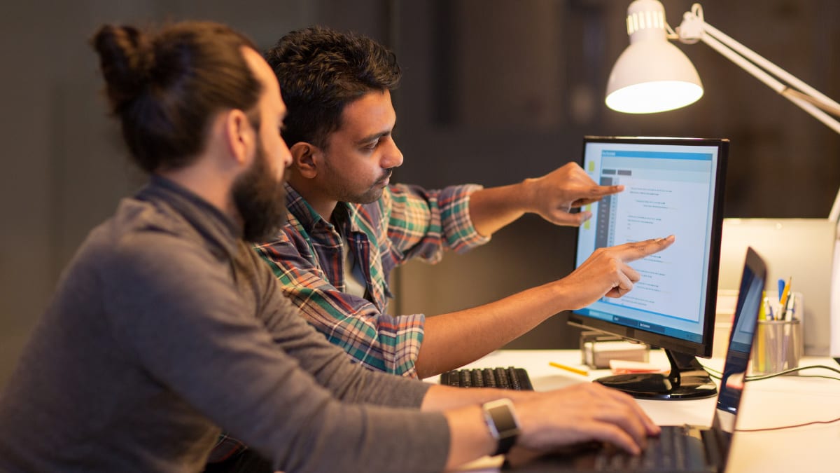 cyber security programmers working together on a cyber threat