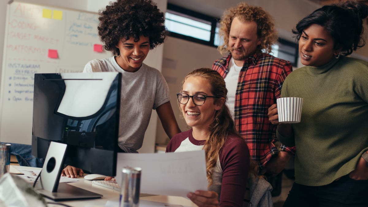 software engineers meeting together in a conference room
