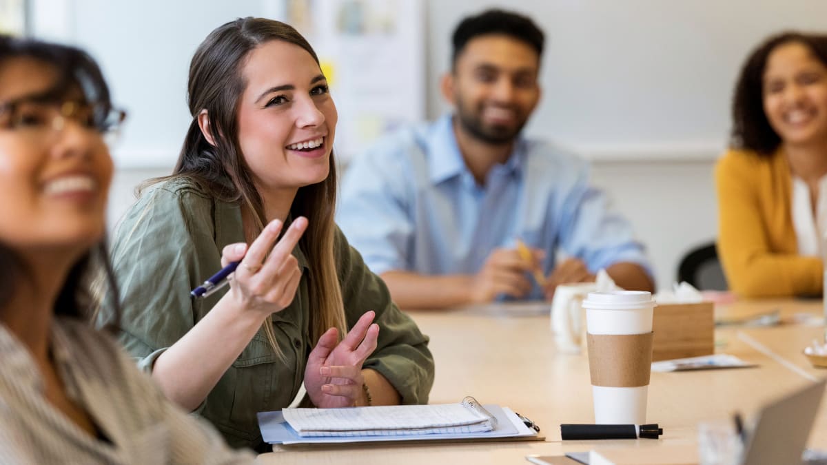 graduate student sitting in on a meeting
