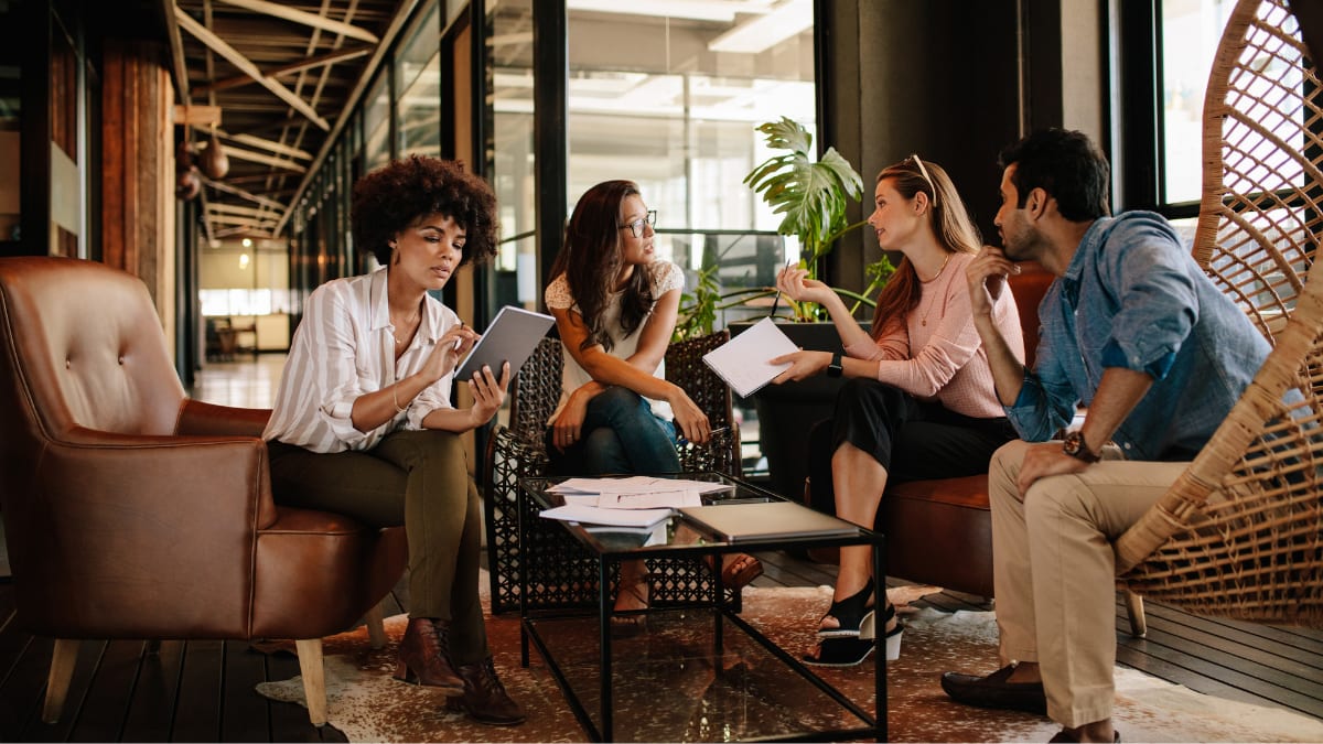 a team of young business professionals meeting together