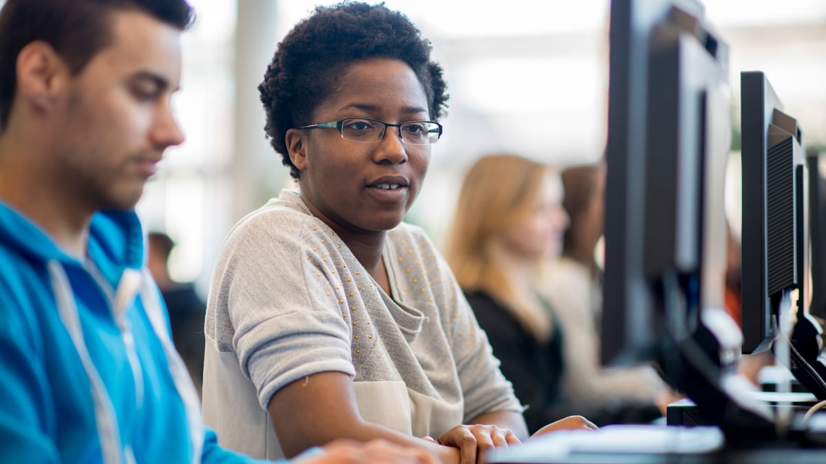 students sitting in a computer lab
