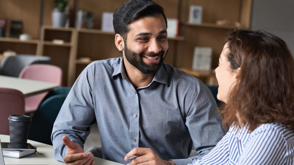 two MBA students meeting together