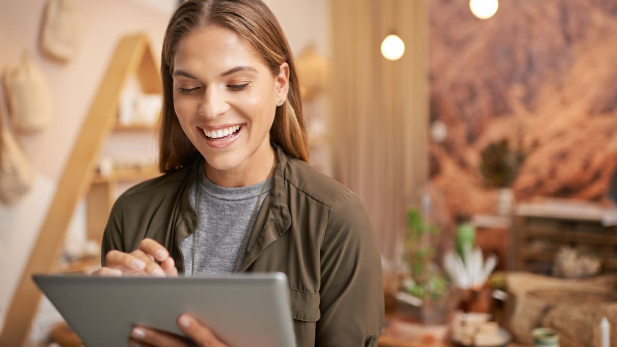 young business professional working on a tablet