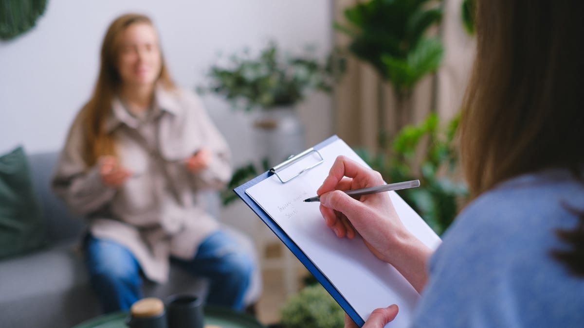 psychologist helping a patient