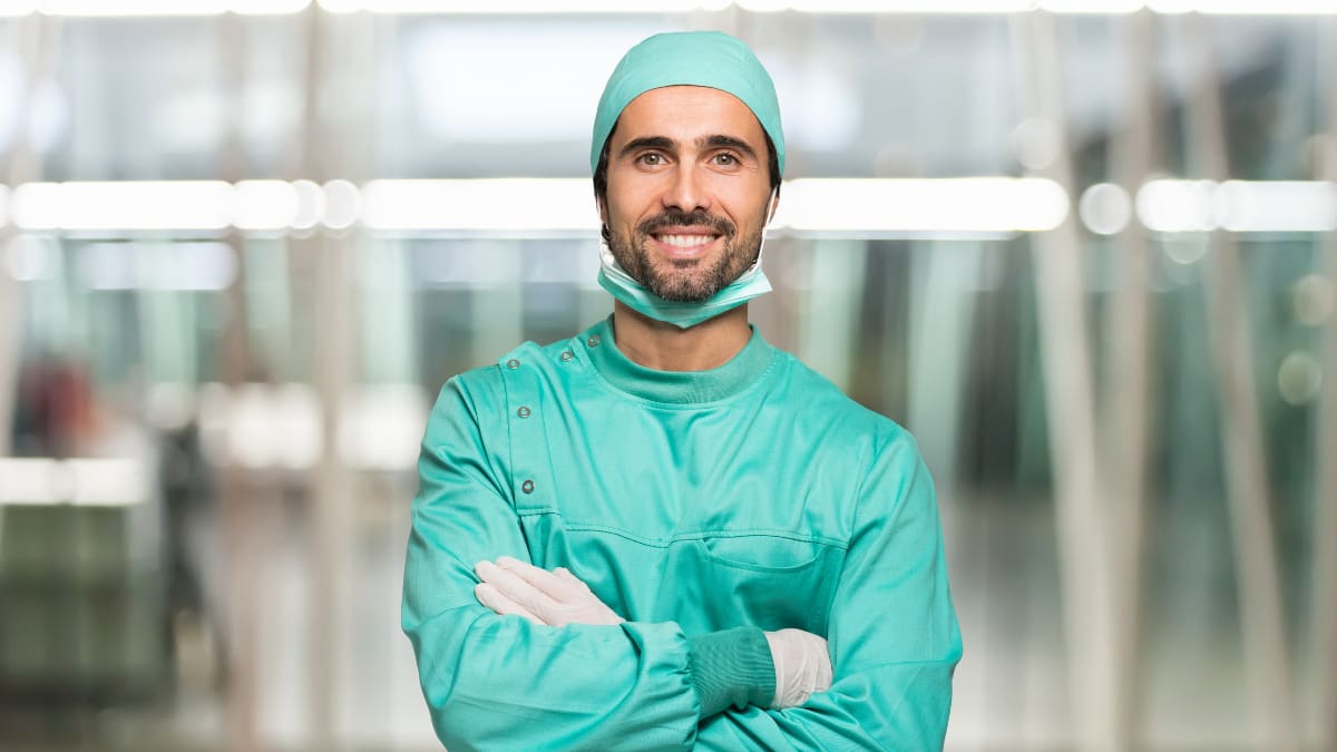 surgeon standing with his arms crossed