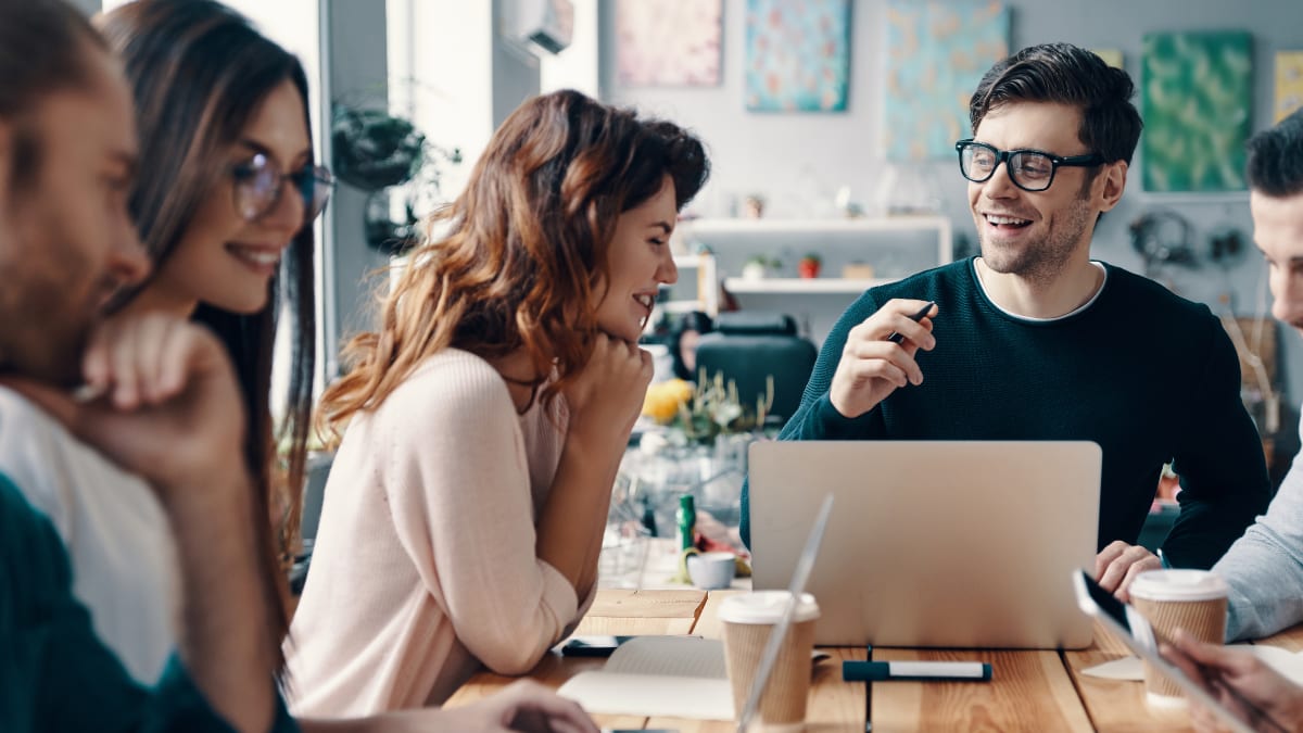 business team meeting together around a table