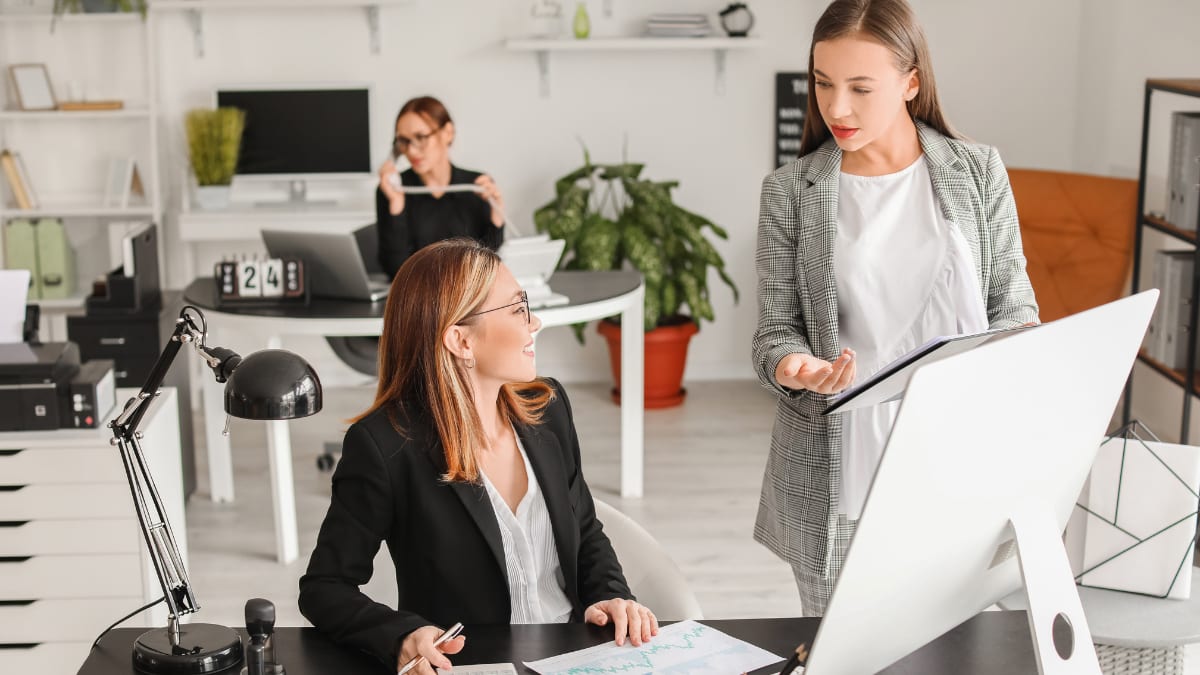 two business professionals meeting together