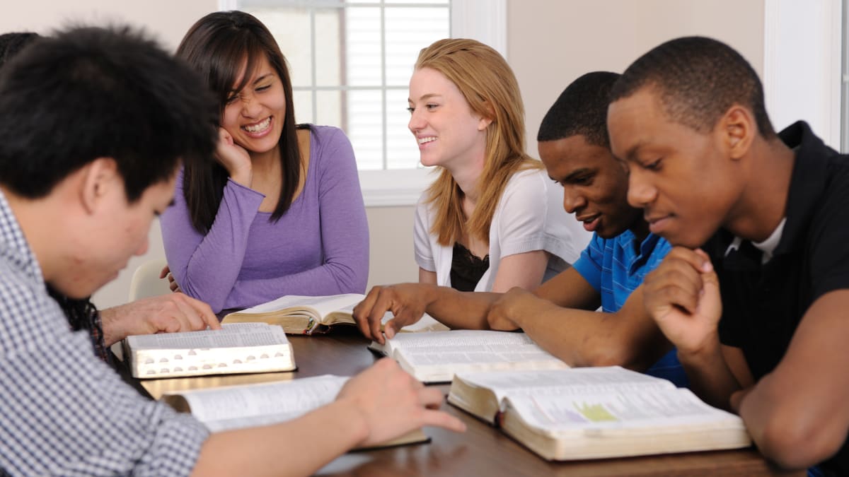 a group of students in a Bible study