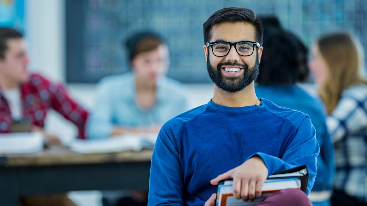 student sitting in a classroom