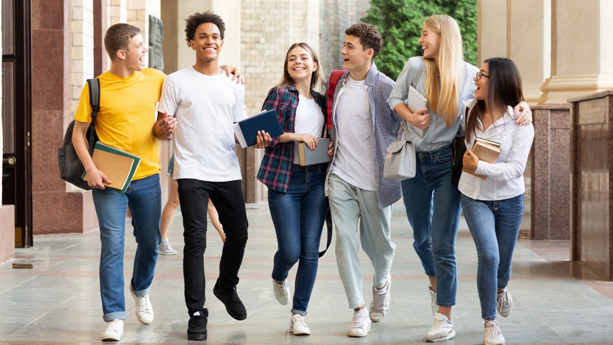 students walking together on college campus