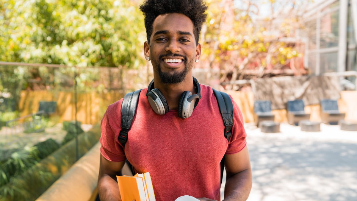 college student standing outside on a college campus