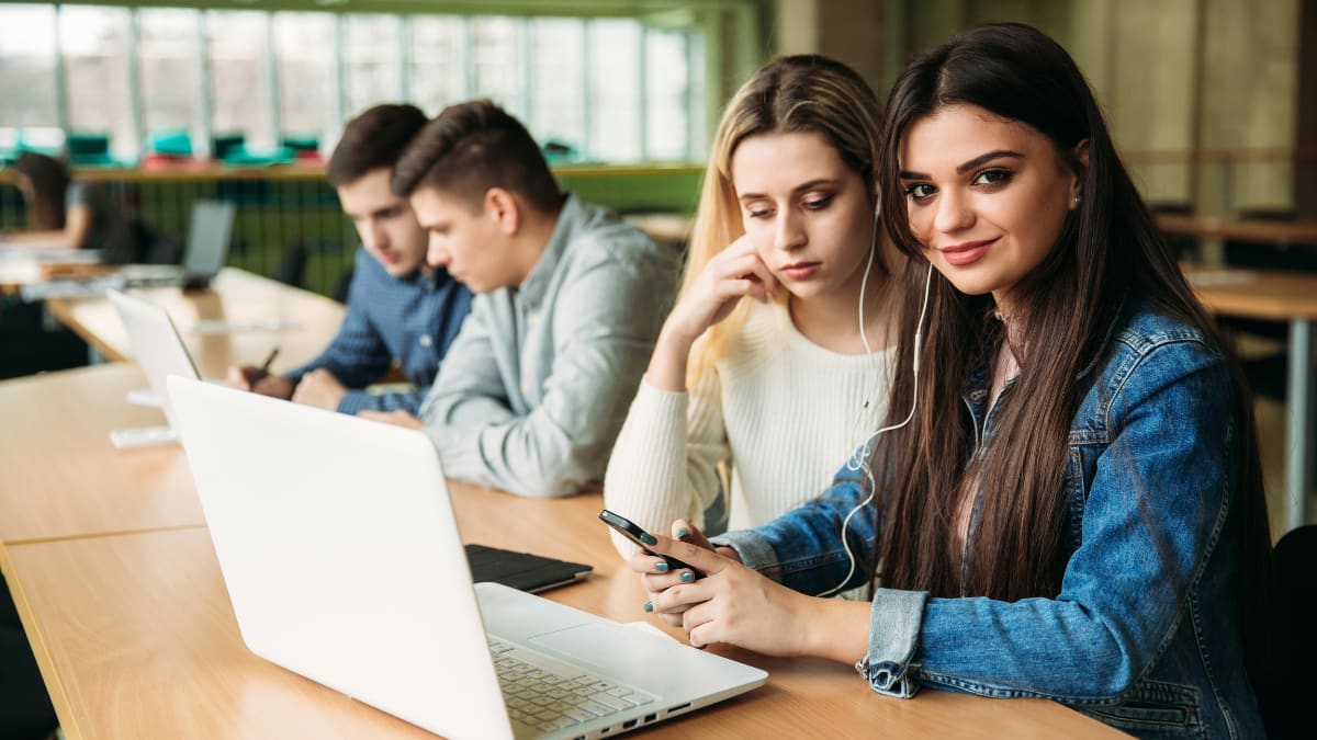 college students studying together in a library