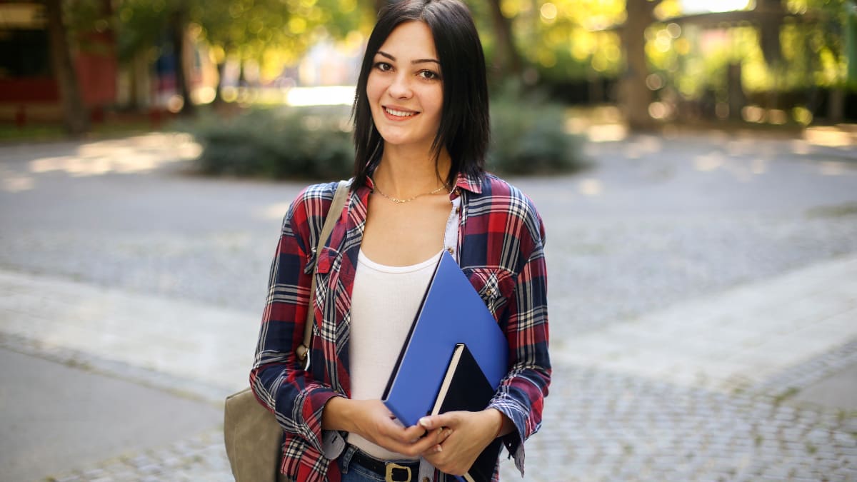 college student standing outside on campus