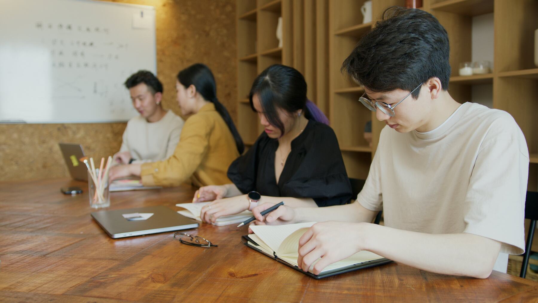 Students studying on a college library